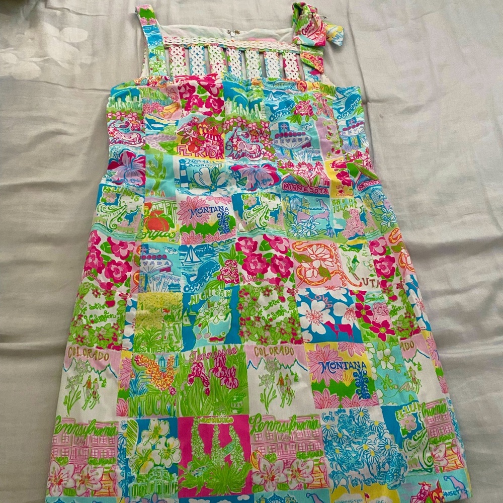 Woman’s size zero Lilly Pulitzer multi colored dress with zipper back closure